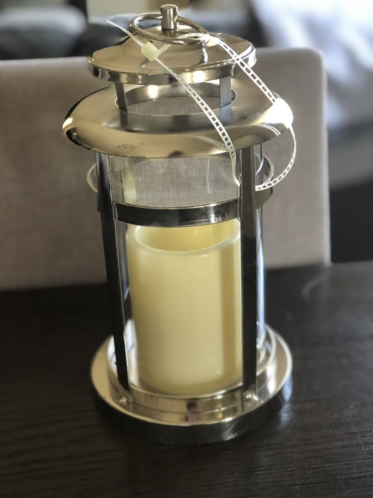 Silver metal lantern with battery operated candle Made In China